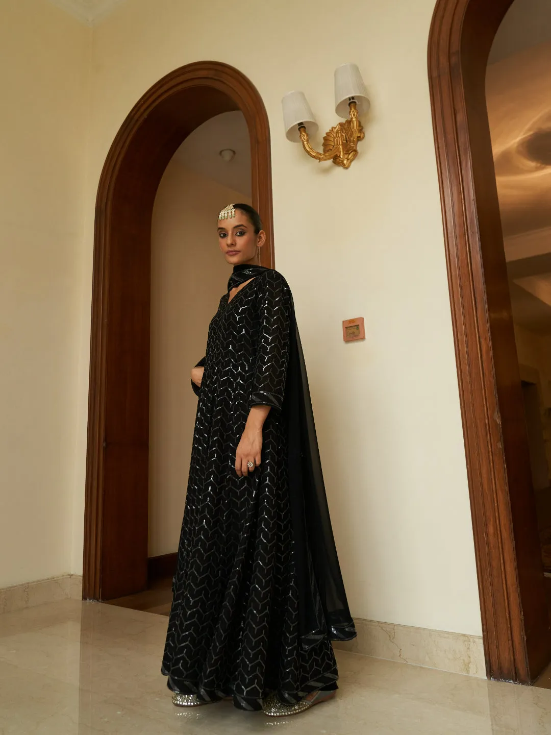 BLACK GEORGETTE ANARKALI SUIT WITH ALLOVER SEQUENCE WORK