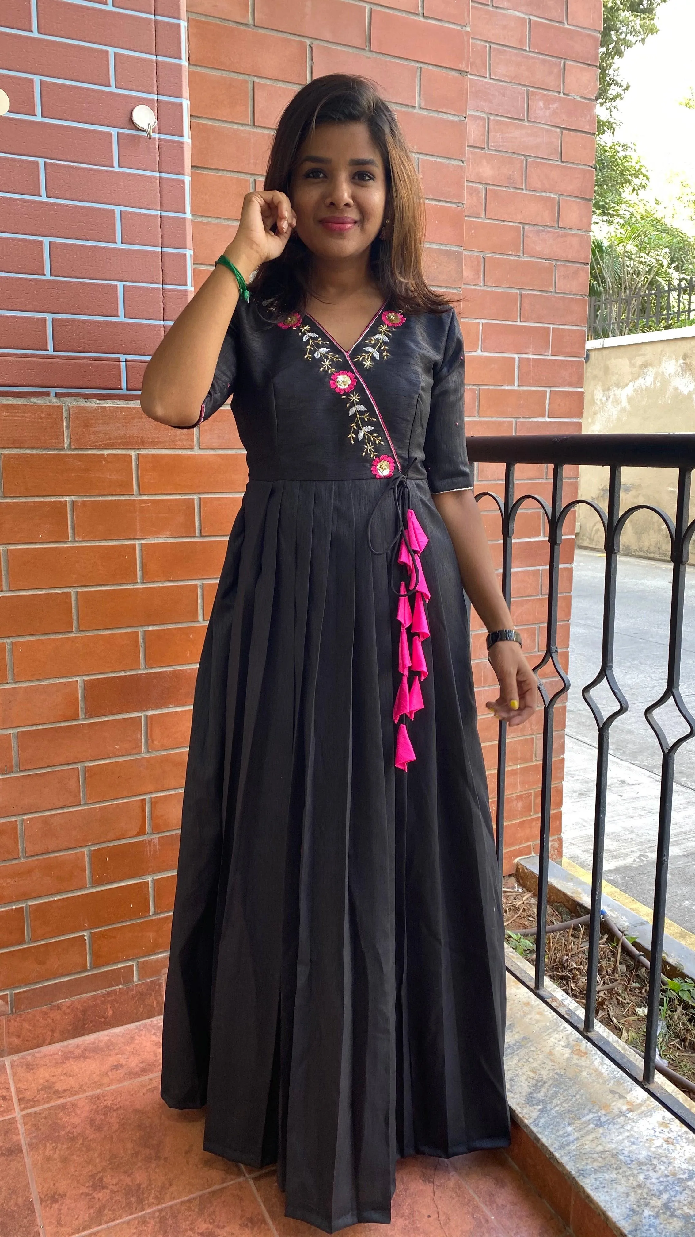 Black silk V neck handworked dress