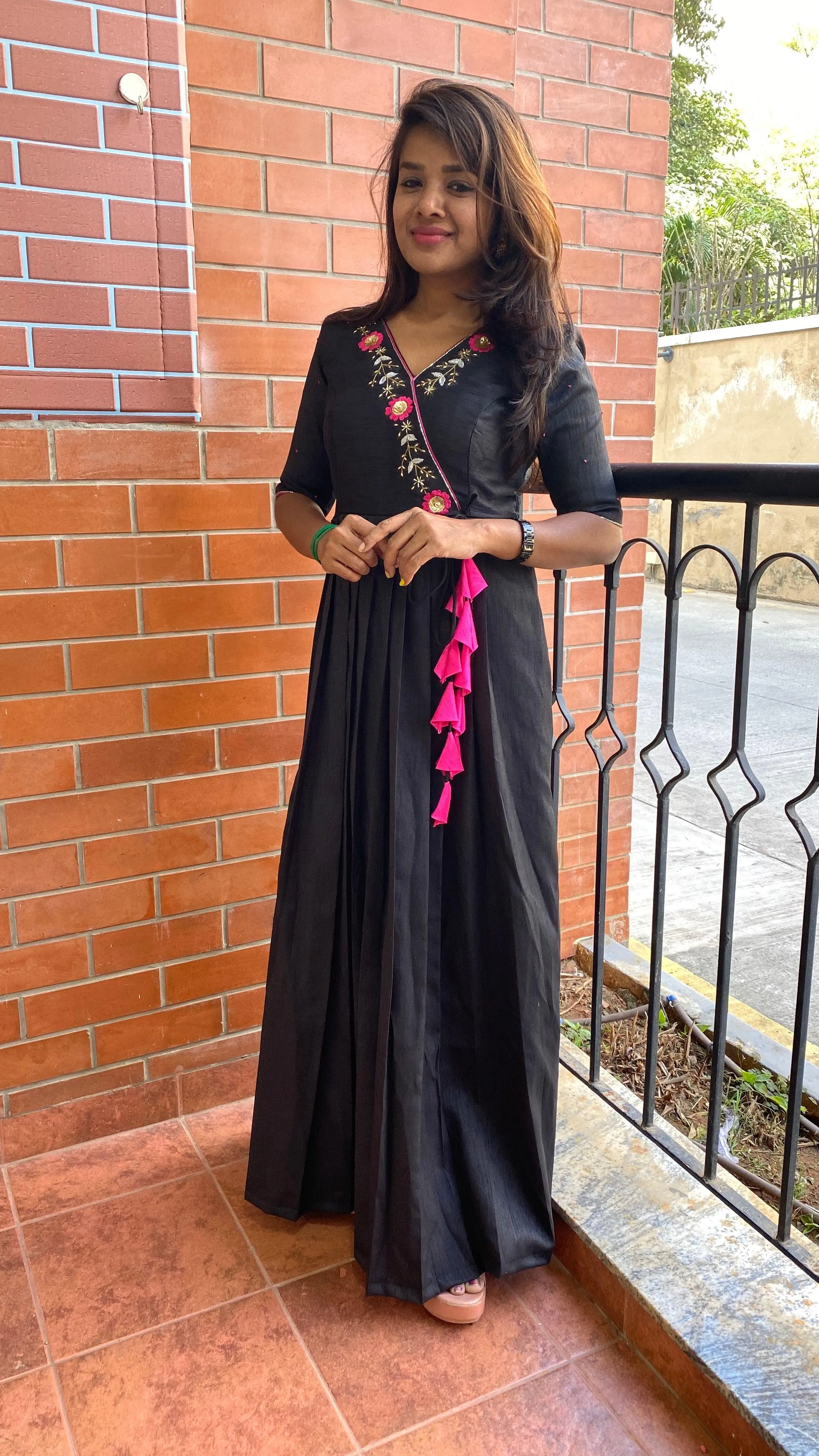 Black silk V neck handworked dress