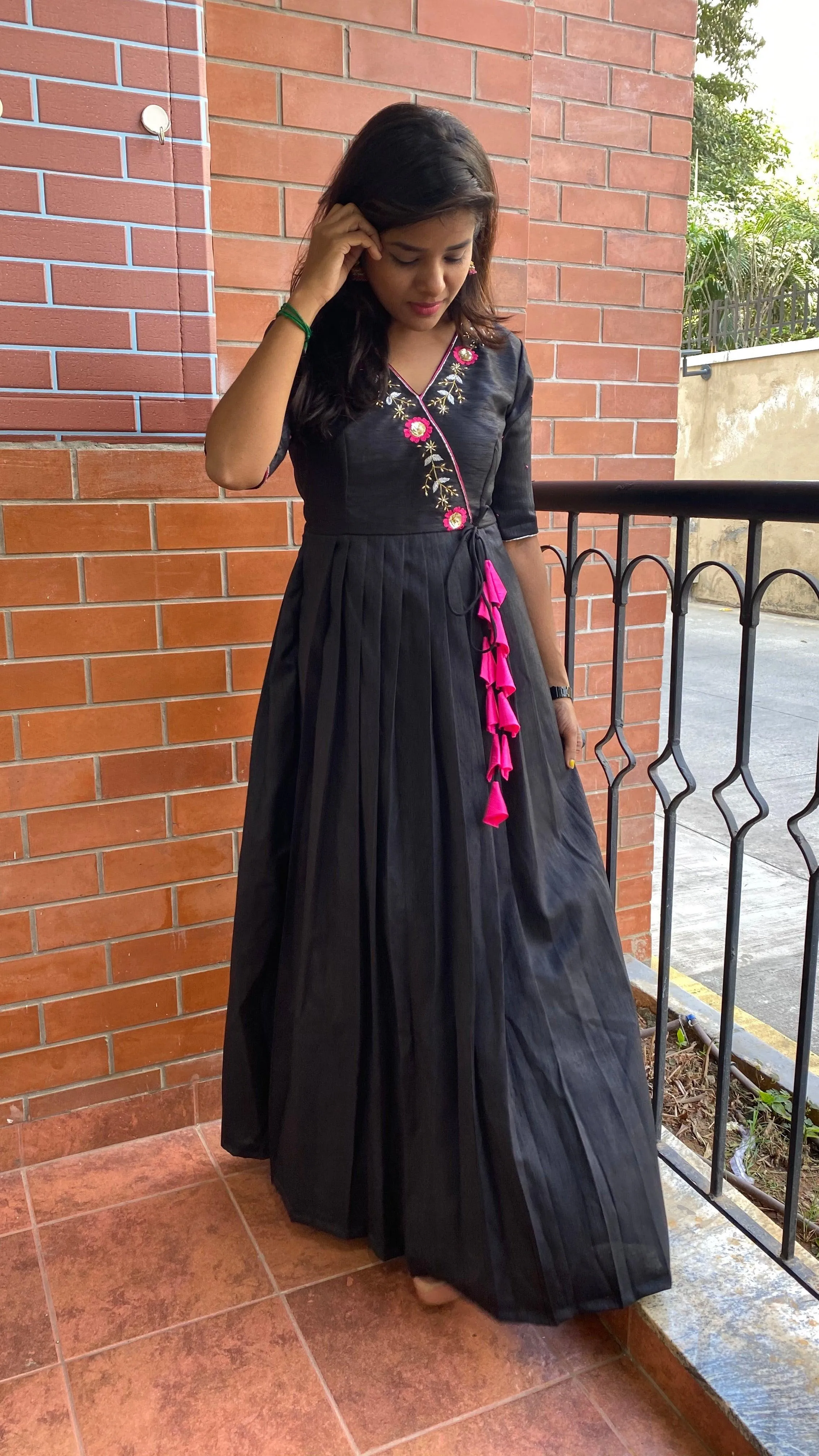 Black silk V neck handworked dress