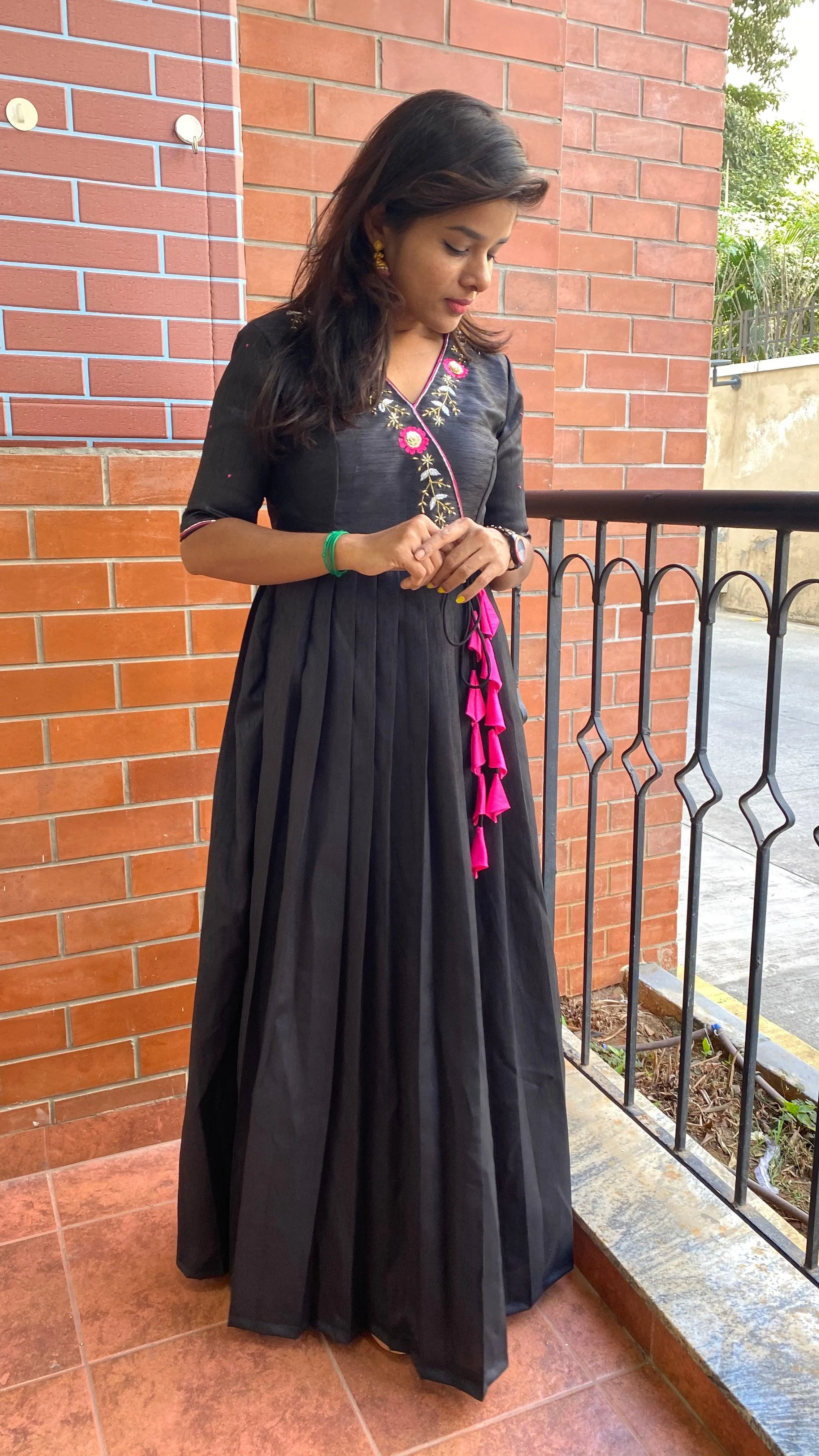 Black silk V neck handworked dress