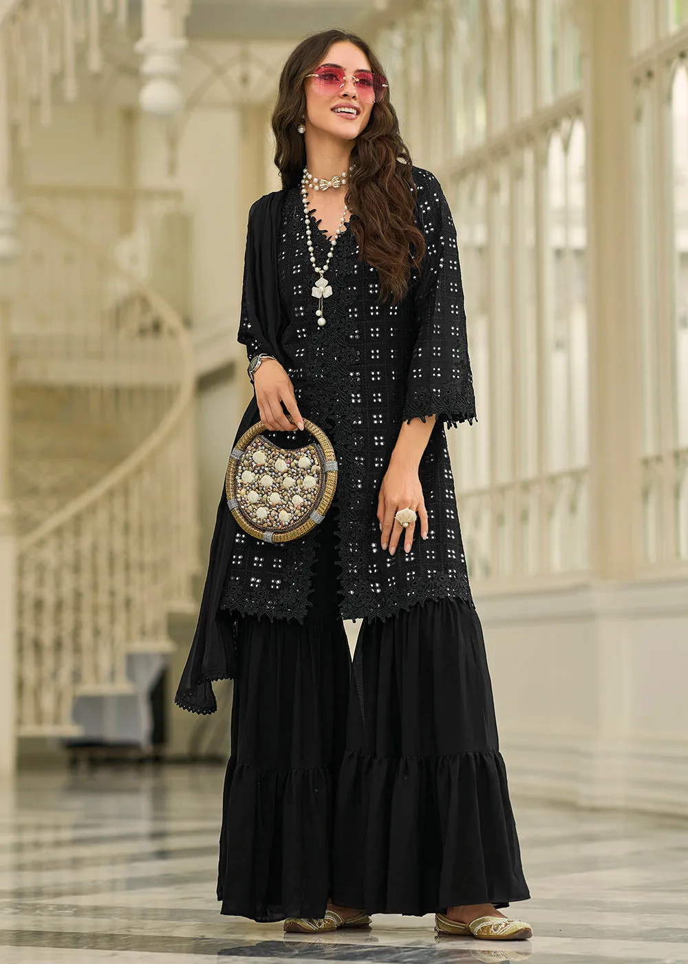 Pleasing Black Fancy Embroidered Festive Gharara Suit